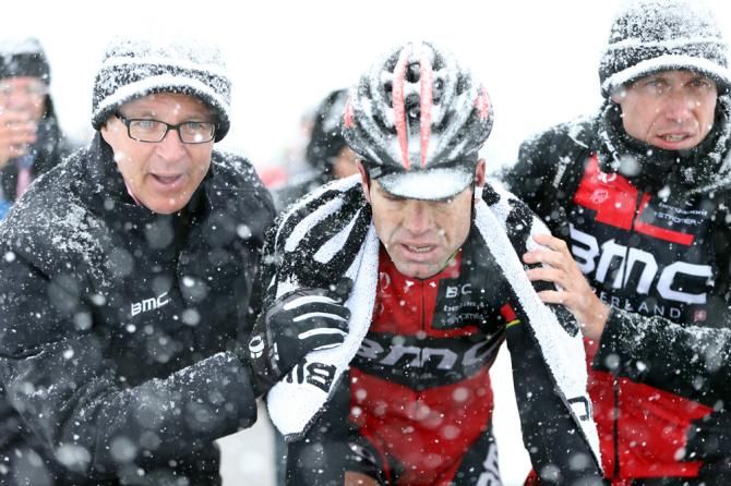 Cadel falls into the arms of his team at Tre Cime di Lavaredo