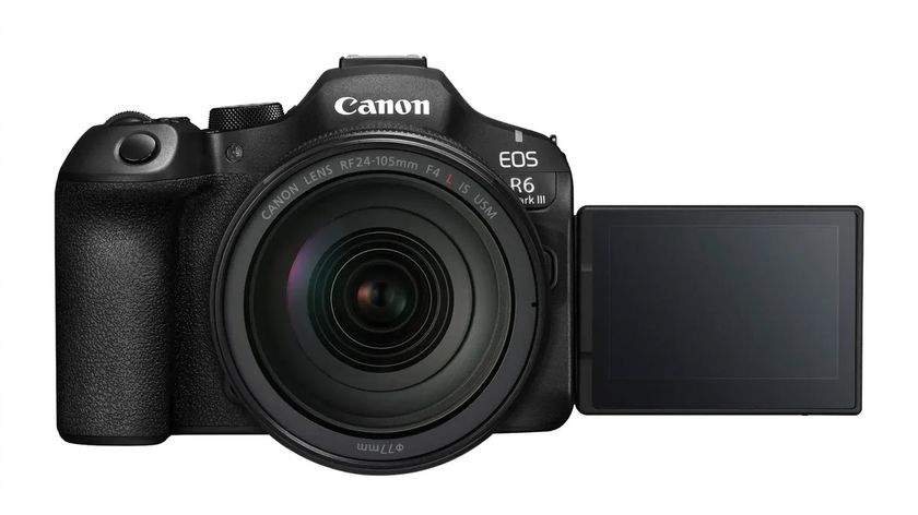 A press shot from Canon of the EOS R6 Mark III on white looking front on to us with the vari-angle LCD screen flipped out