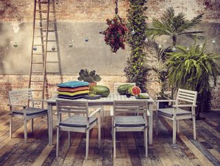 rustic and industrial style decking with plenty of plants