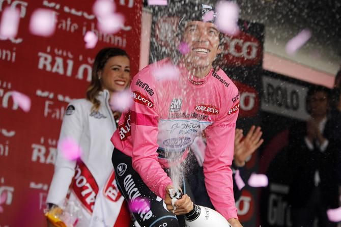 Rigoberto Uran (Omega Pharma) celebrates day one in the Giro race lead