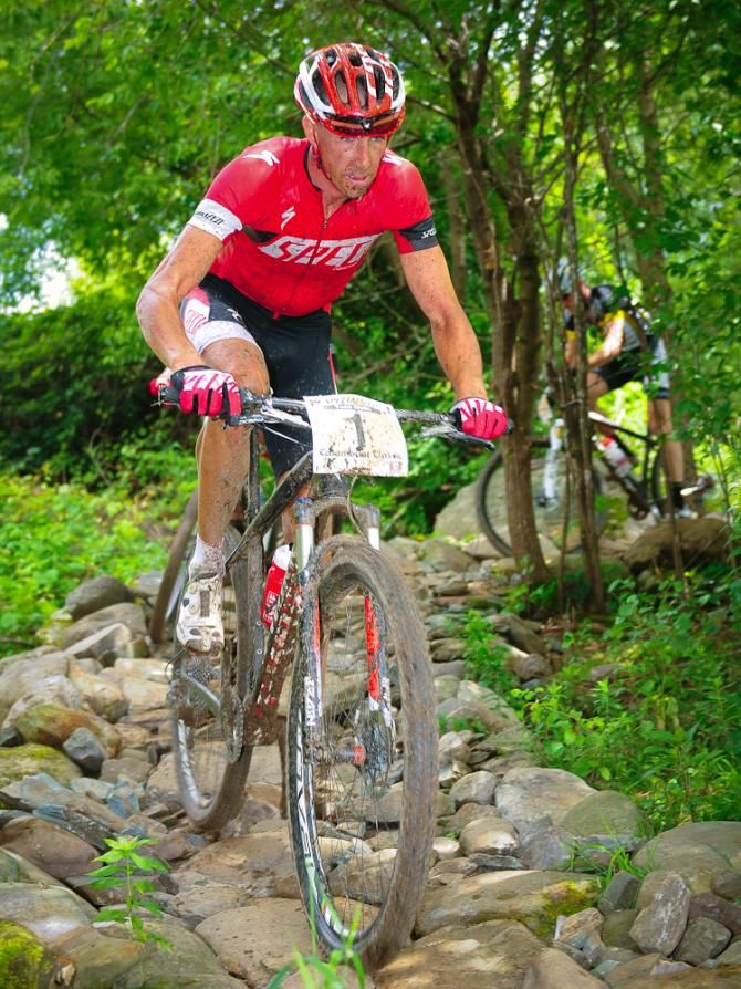 Todd Wells (Specialized) riding in third place behind Jeremiah Bishop