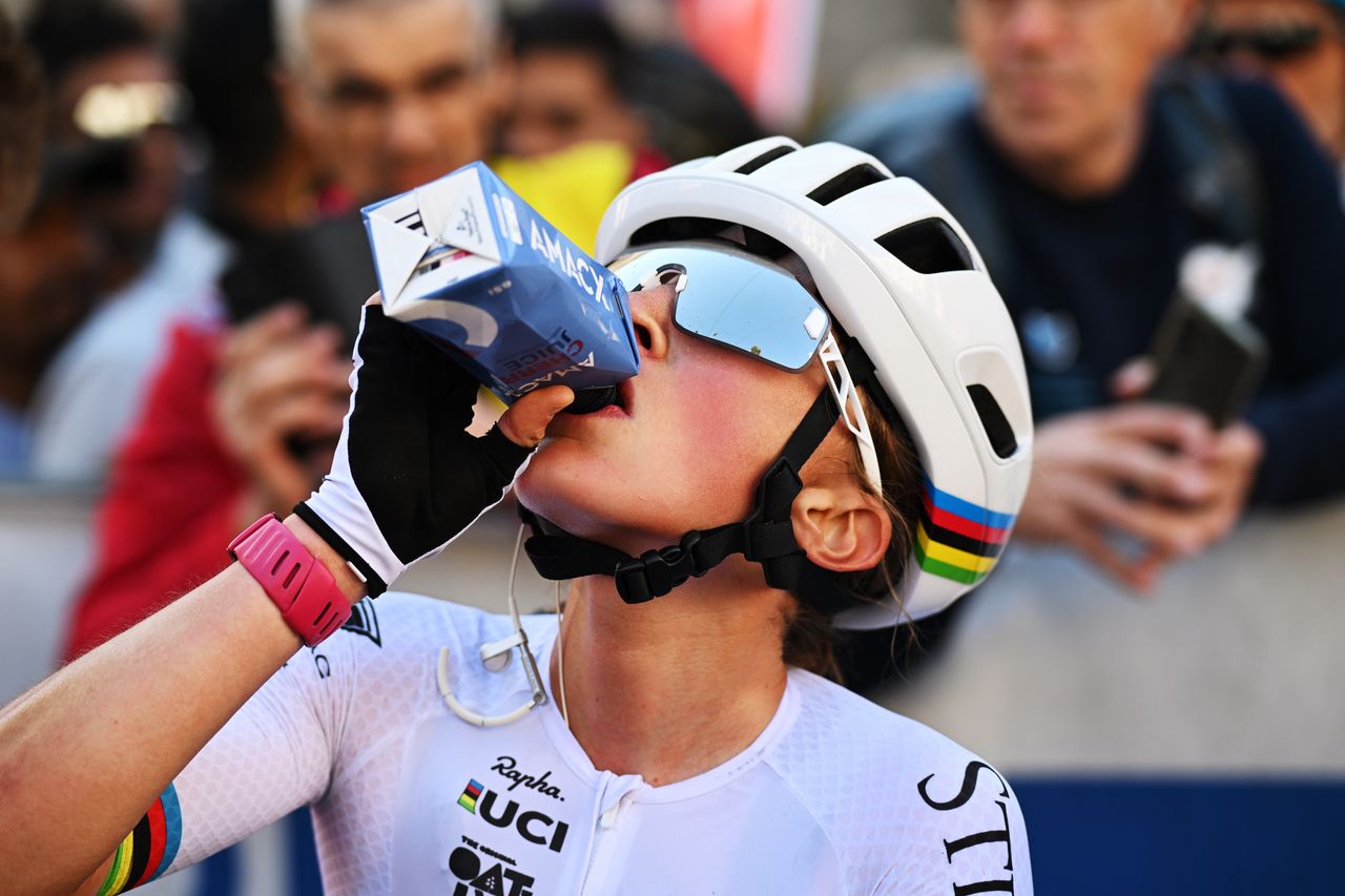 Magdeleine Vallieres drinks from a carton at the Tre Valli Varesine 2025