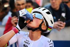 Magdeleine Vallieres drinks from a carton at the Tre Valli Varesine 2025