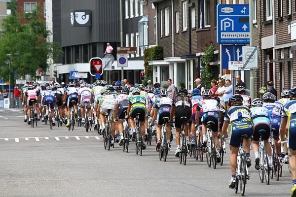 The peloton was winding it up with a lap to go.