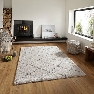 dunelm sale: grey rug with white features