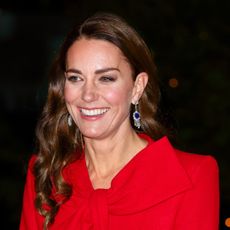 Catherine, Duchess of Cambridge (wearing Queen Elizabeth, The Queen Mother's Sapphire and Diamond Fringe Earrings) attends the 'Together at Christmas' community carol service at Westminster Abbey on December 8, 2021 in London, England. The carol service, hosted and spearheaded by The Duchess of Cambridge, pays tribute to the work of individuals and organisations across the UK who have supported their communities through the COVID-19 pandemic. 