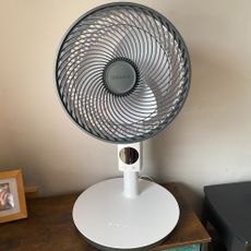 Meaco MeacoFan Sefte 10'' pedestal air circulator fan in table-top mode on a side table