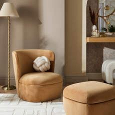 Modern curves chair in soft brown with matching footstool.