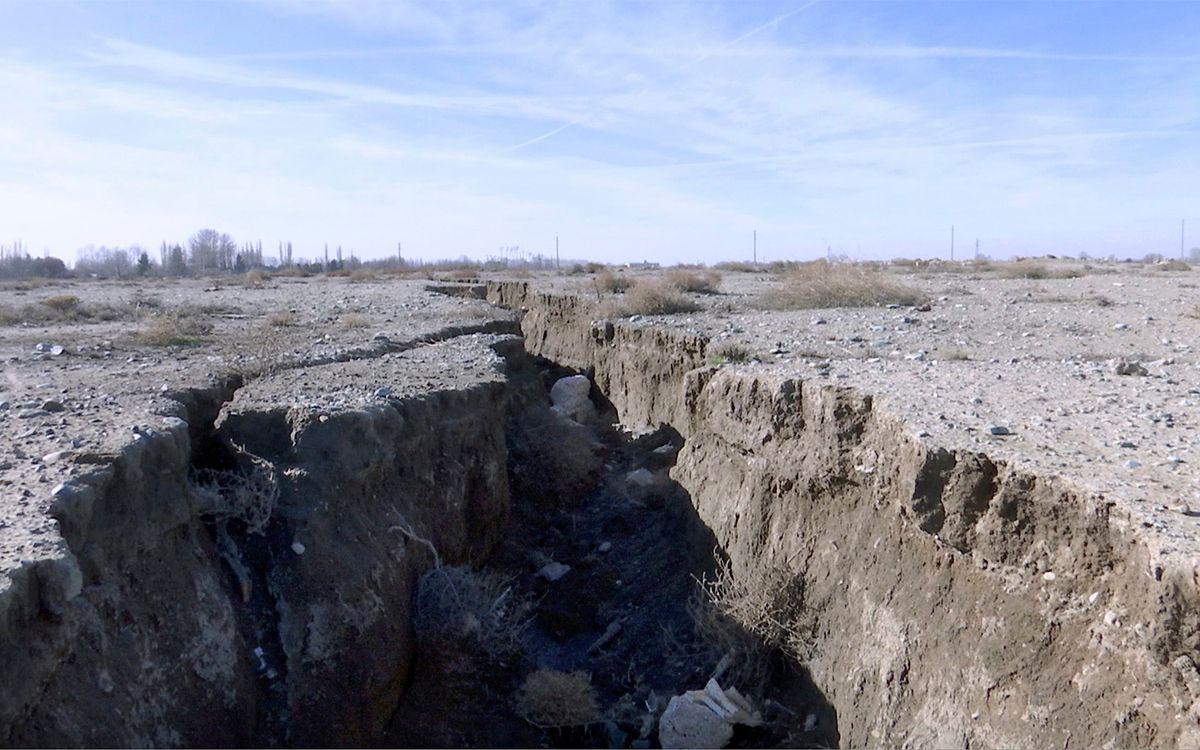 Drought and excessive water pumping in Malard, west of Tehran, Iran, caused a fissure to open up, shown here Jan. 8, 2019. Now, the area around the capital Tehran is sinking.