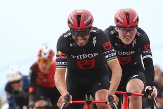 Tudor Pro Cycling Team's French rider Julian Alaphilippe (C) reacts as he crosses the finish line of the 5th stage of the Paris-Nice cycling race, 203,3 km between Saint-Just-en-Chevalet and La CÃ´te-Saint-AndrÃ©, on March 13, 2025. (Photo by Anne-Christine POUJOULAT / AFP)