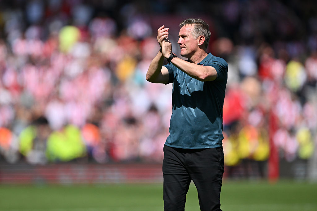 Phil Parkinson applauds the Wrexham fans