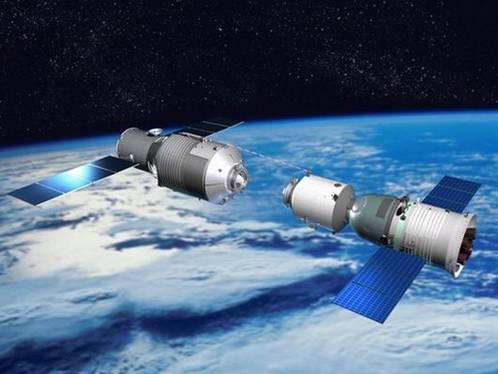 This illustration depicts a Chinese Shenzhou vehicle approaching another module during orbital rendezvous and docking tests, a precursor for space station construction.