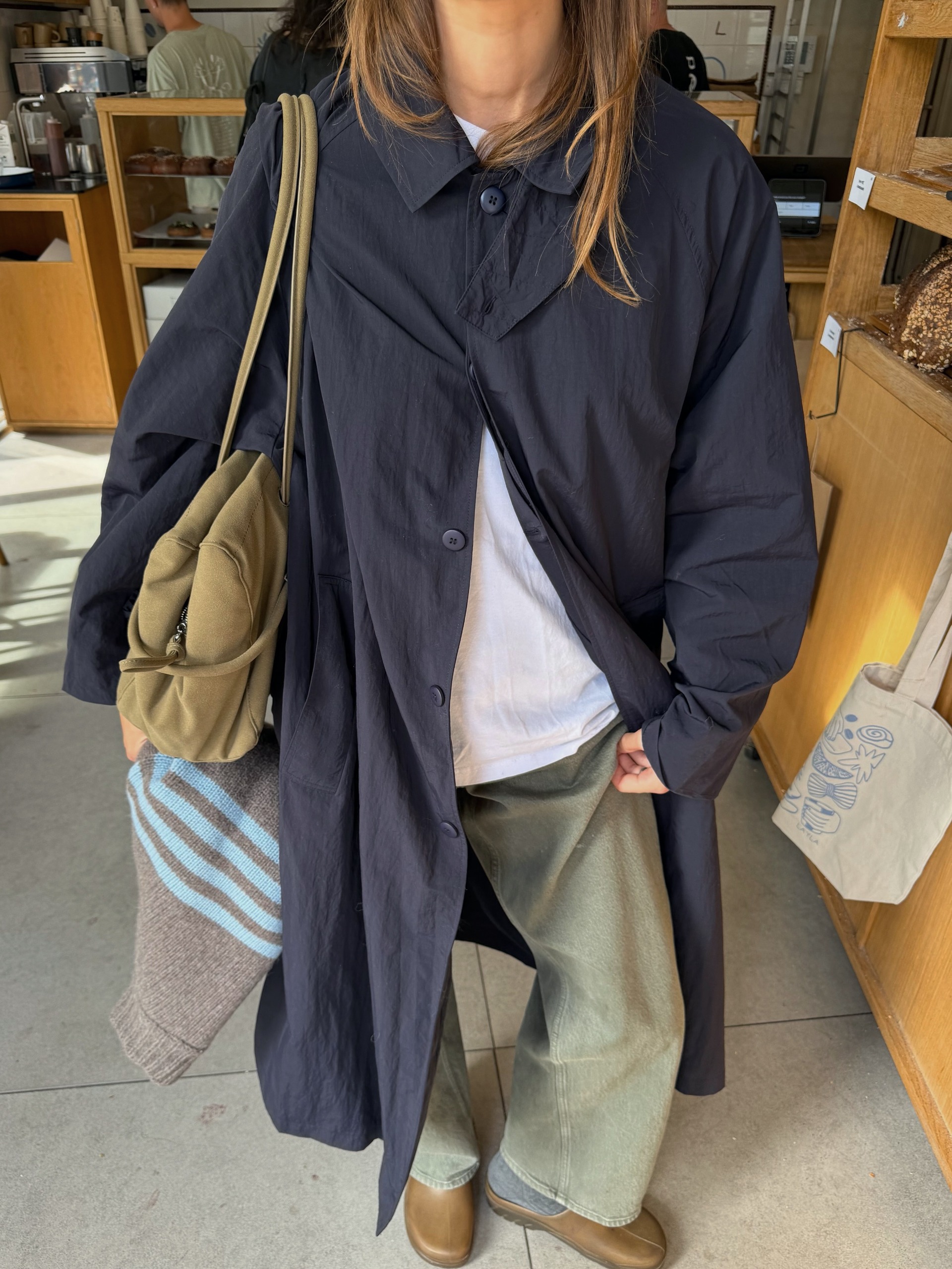 Poppy Almond wearing wardrobe staples.
