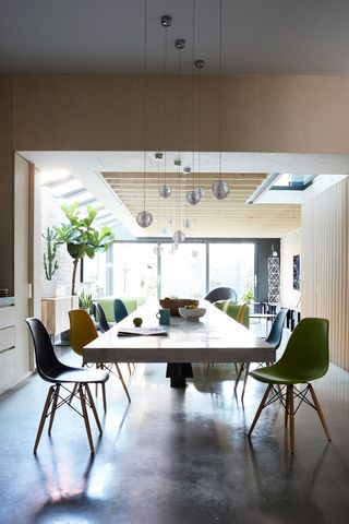 dining space with transparent pendant lights