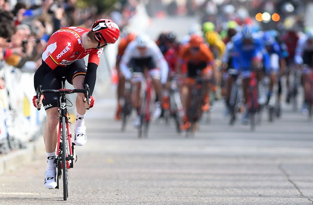 Pim Ligthart (Lotto-Soudal) checks his time gap back to the fast finishing peloton