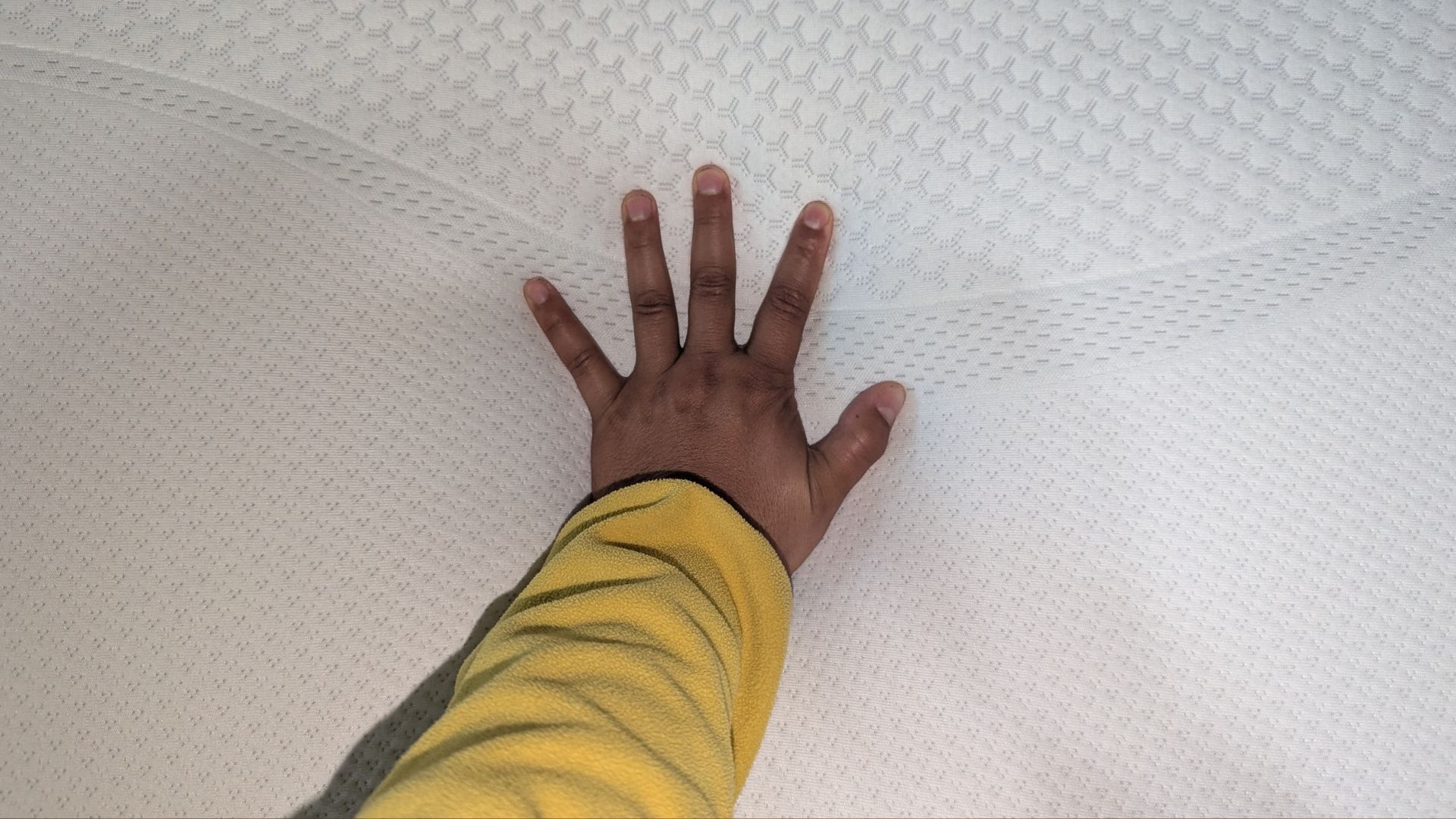 The image shows the Sleep Number i8 mattress during testing