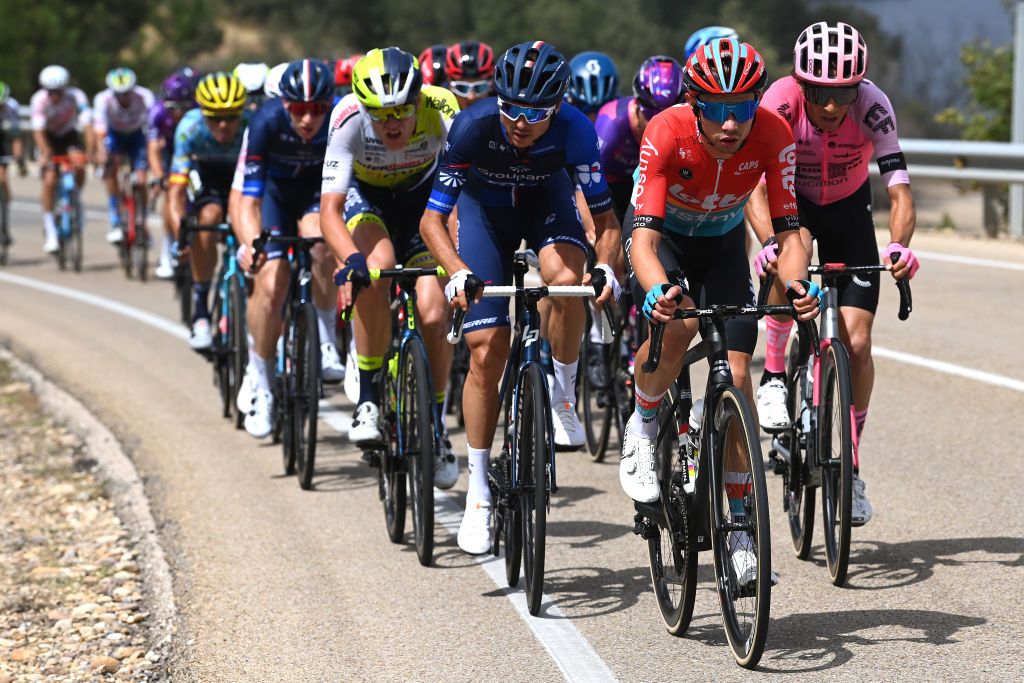 LA LAGUNA NEGRAVINUESA SPAIN SEPTEMBER 06 LR Alan Jousseaume of France and Team TotalEnergies Rudy Molard of France and Team Groupama FDJ and Andreas Kron of Denmark and Team Lotto Dstny compete in the breakaway during the 78th Tour of Spain 2023 Stage 11 a 1632km stage from Lerma to La Laguna Negra Vinuesa 1730m UCIWT on September 06 2023 in La Laguna NegraVinuesa Spain Photo by Tim de WaeleGetty Images