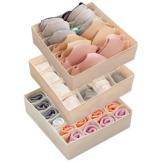 Three nude colored fabric drawer organizers