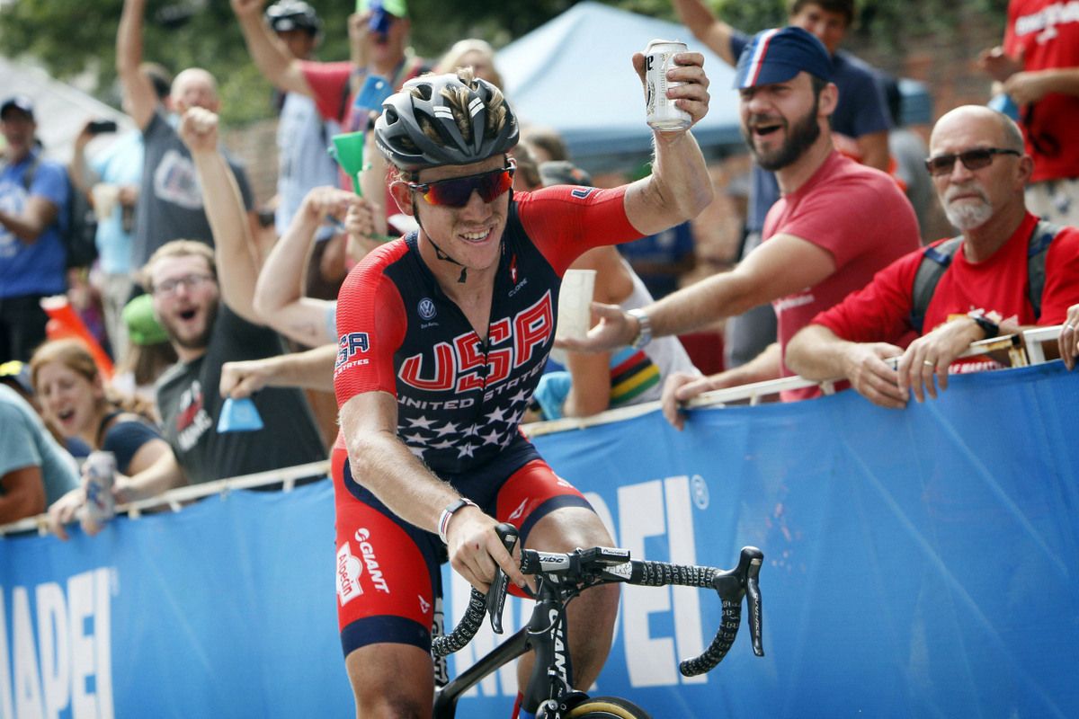 Lawson Craddock (USA) enjoys a beer handed to him from the crowd