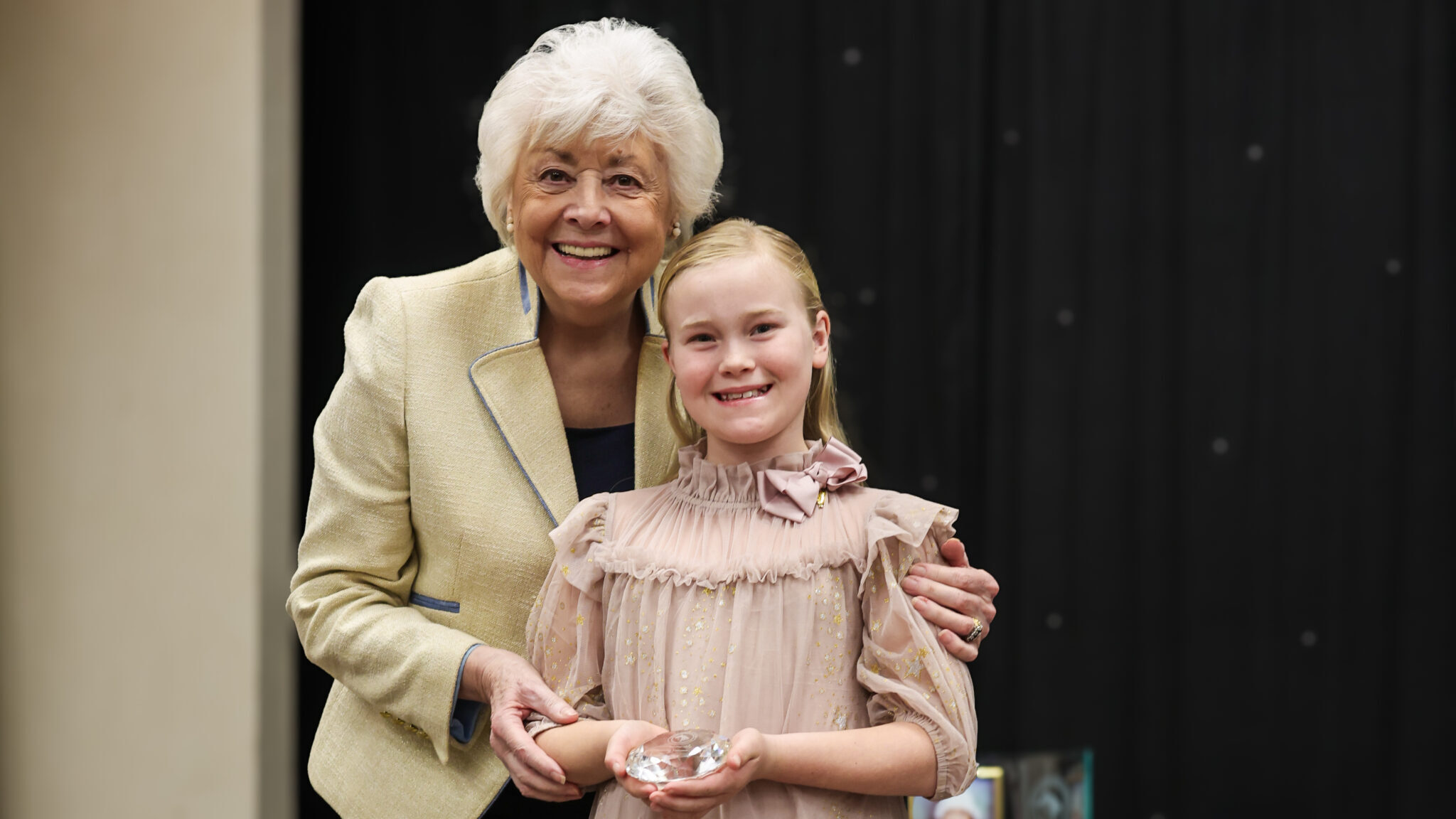 BSPS award winner Anya Dewey Clark and Pat Pattinson stand for a photo after Anya is presented her award.
