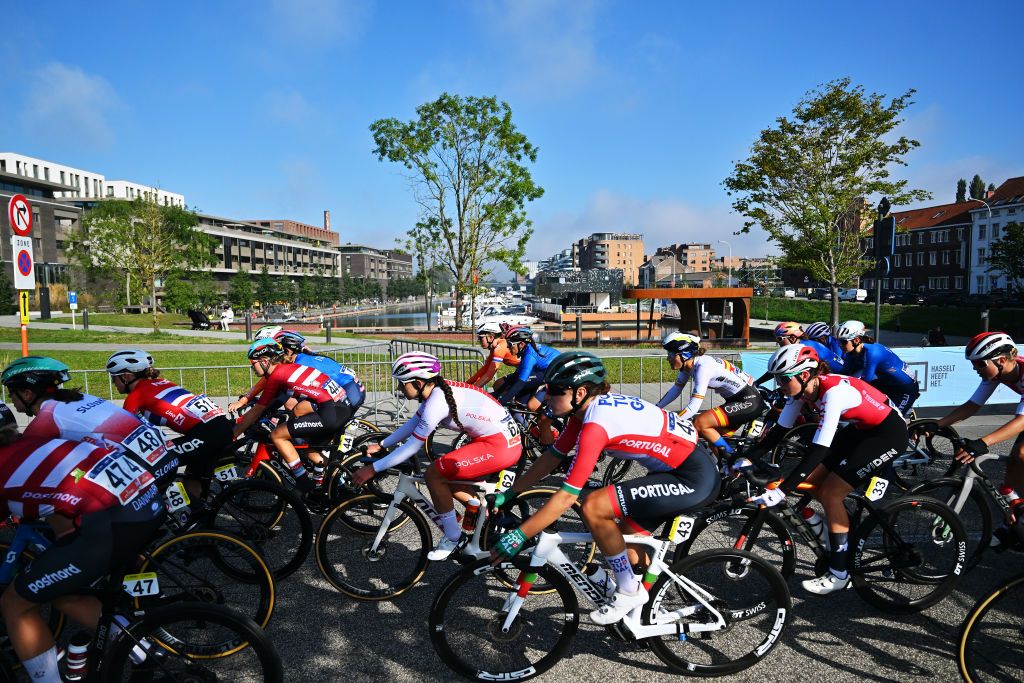 HASSELT BELGIUM SEPTEMBER 13 LR Mille Troelsen of Team Denmark Terezia Ciriakova of Team Slovakia Magdalene Lind of Team Norway Alberte Greve of Team Denmark Olga Wankiewicz of Team Poland Daniela Campos of Team Portugal Laura Ruiz Perez of Team Spain Lea Huber of Team Switzerland and a general view of the peloton competing during the 30th UEC Road Cycling European Championships 2024 Womens U23 Road Race a 1014km one day race from HeusdenZolder to Hasselt UCIWWT on September 13 2024 in Hasselt Belgium Photo by Luc ClaessenGetty Images