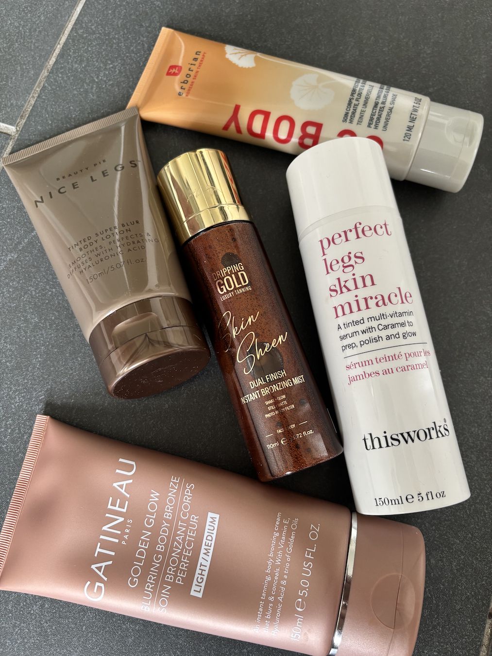 a photo of some of the best tinted leg serums