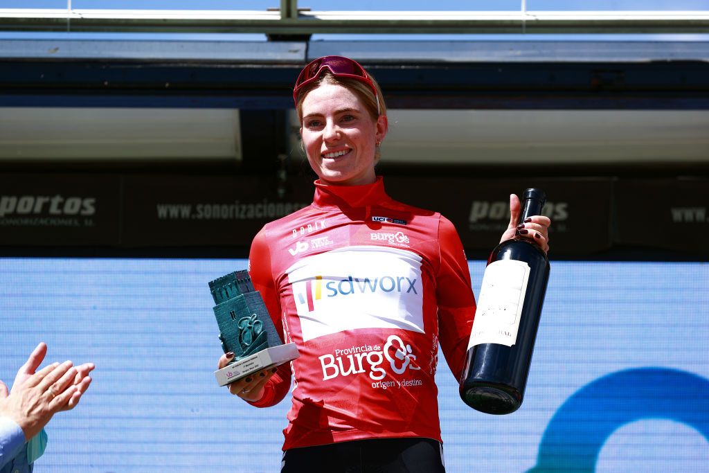 LAGUNAS DE NEILA SPAIN MAY 22 Demi Vollering of Netherlands and Team SD Worx celebrates at podium as Red Mountain Jersey winner during the 7th Vuelta a Burgos Feminas 2022 Stage 4 a 1251km stage from Covarrubias to Lagunas de Neila 1867m VueltaBurgos BurgosFem UCIWWT on May 22 2022 in Lagunas de Neila Spain Photo by Gonzalo Arroyo MorenoGetty Images