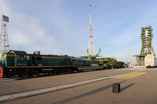 The Soyuz launch vehicle with Progress M-21M cargo vehicle rolled out and was installed on the launch pad at the Baikonur launch site, Kazakhstan, on Nov. 23, 2013. Launch is scheduled for Nov. 25.