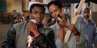 Troy and Abed at a vigil in Community.