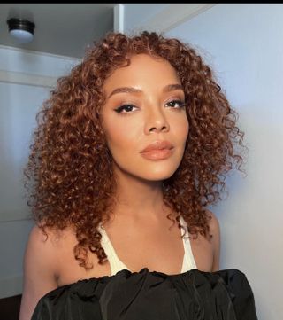 Tessa Thompson with copper hair