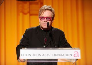 Musician Elton John speaks onstage at the 19th Annual Elton John AIDS Foundation Academy Awards Viewing Party at the Pacific Design Center on February 27, 2011 in West Hollywood, California. (Photo by Dimitrios Kambouris/WireImage)
