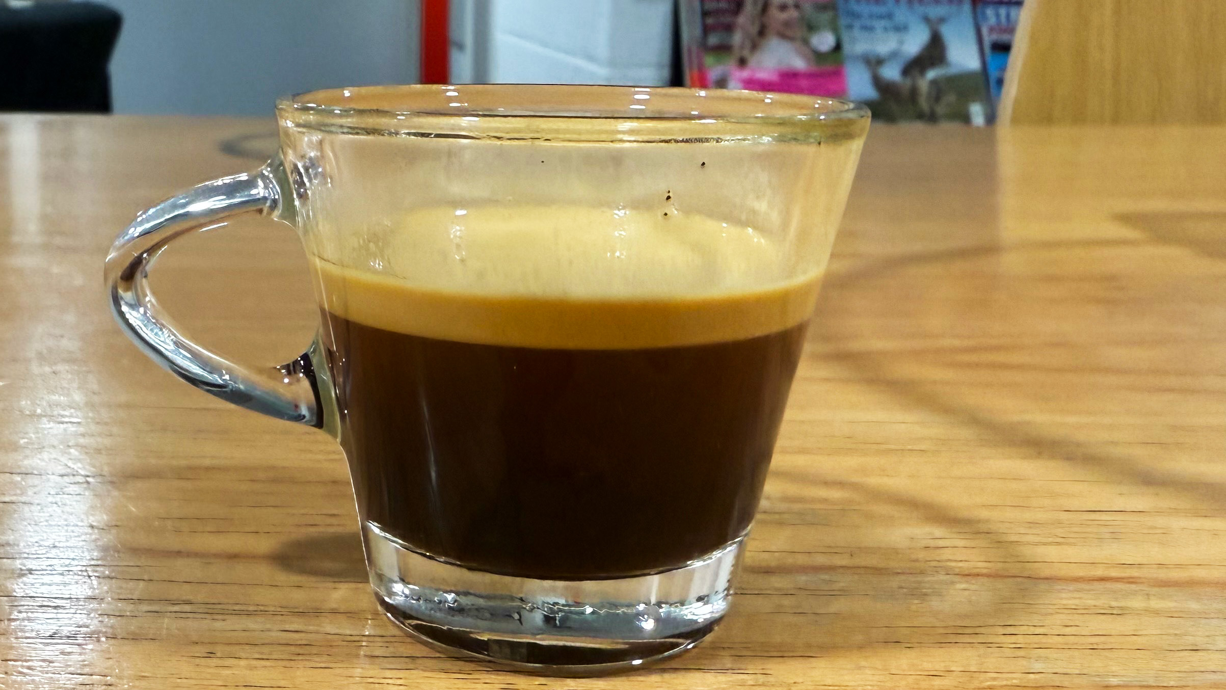 a shot of espresso made on the casabrews 3700 essential