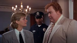 John Candy introduces himself to Valri Bromfield in Who's Harry Crumb.