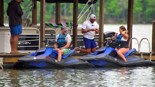 jeramey (center left) and sarah ann (right) prepare to ride jetskis on 'love is blind' season 6