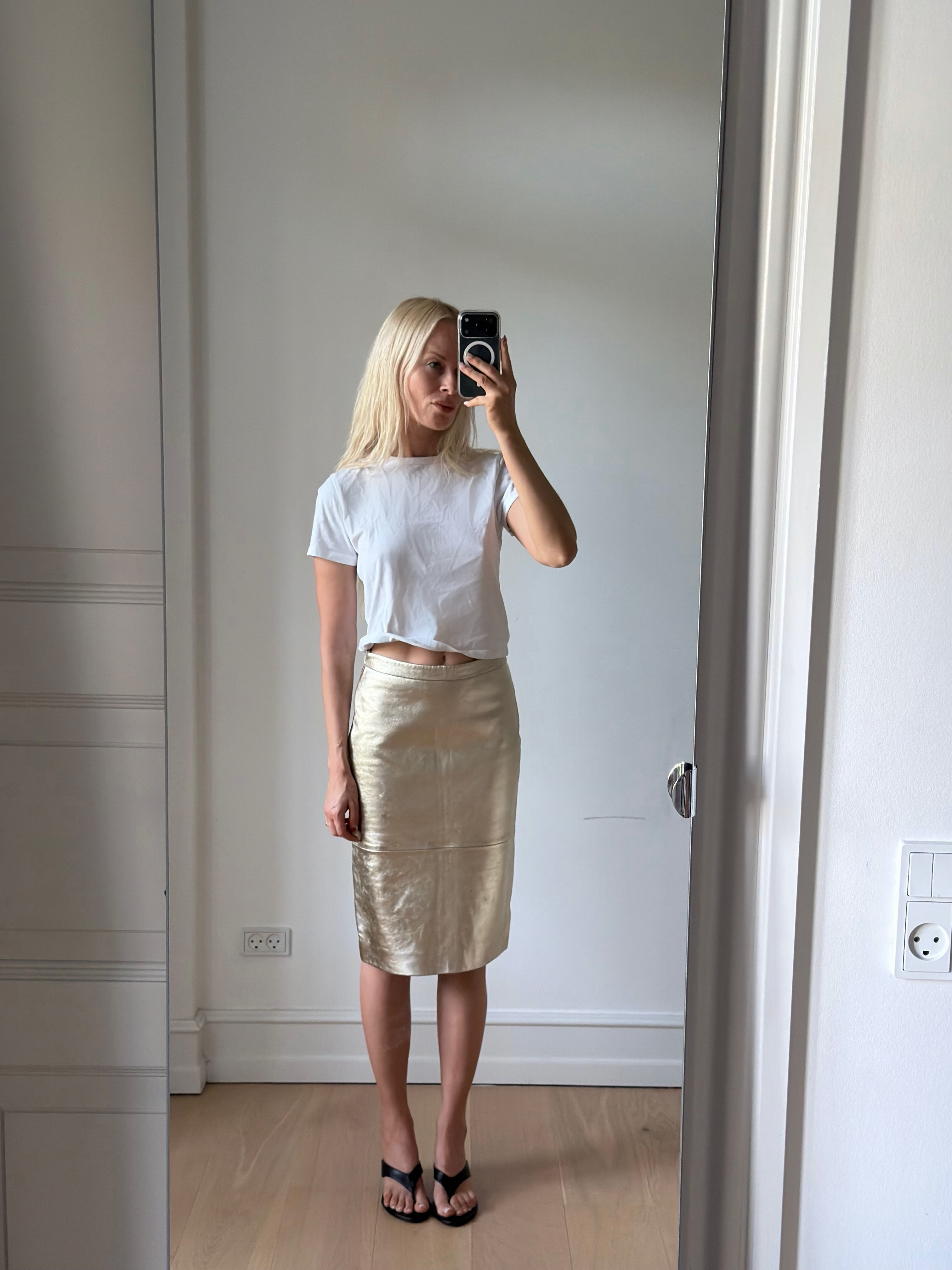 An image of a woman wearing best off white skirt for summer