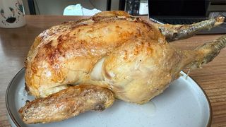 a whole roast chicken roasted in the philips 2000 series air fryer