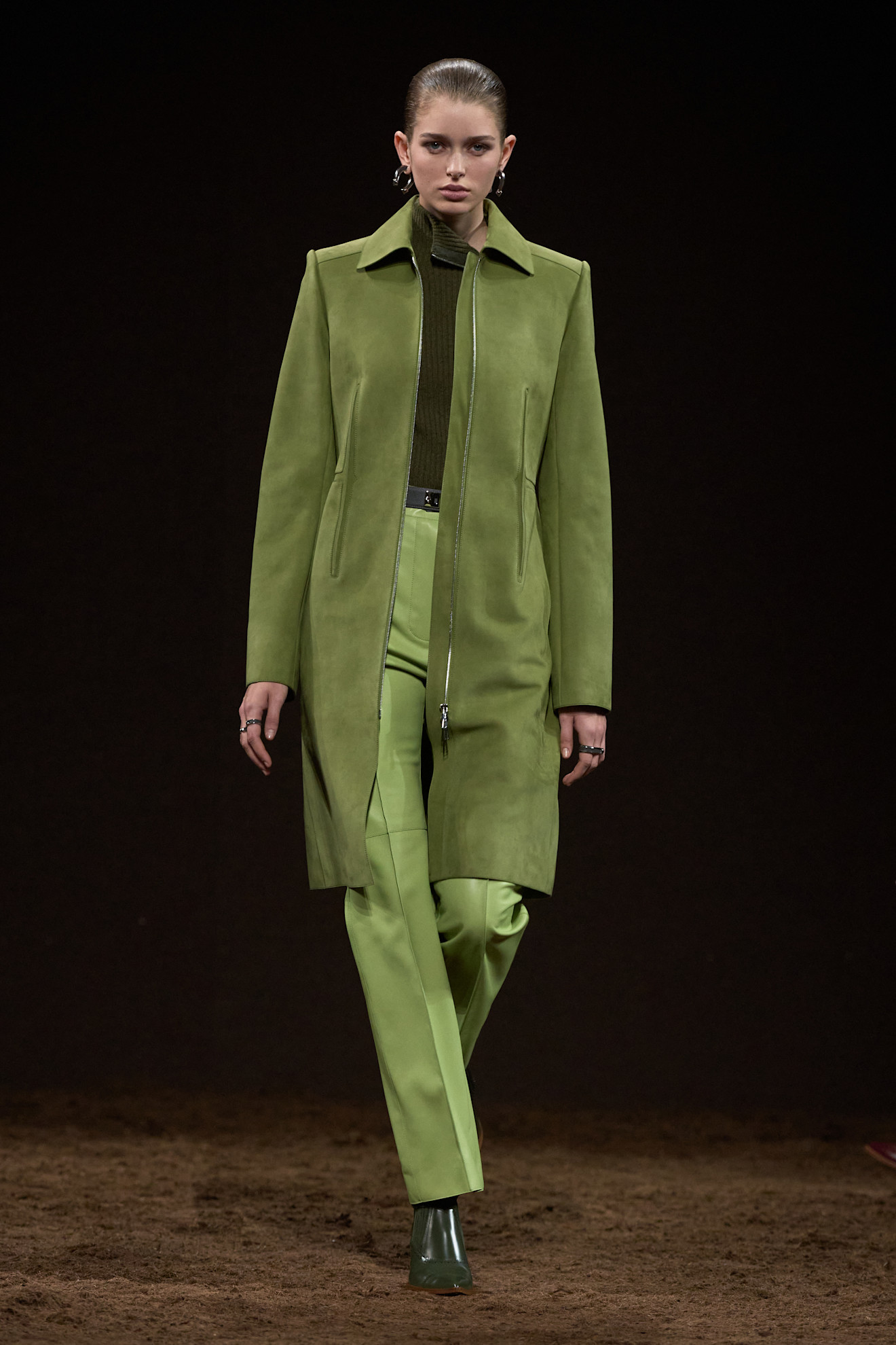 A model wore lime green on the Hermes Fall 2025 runway