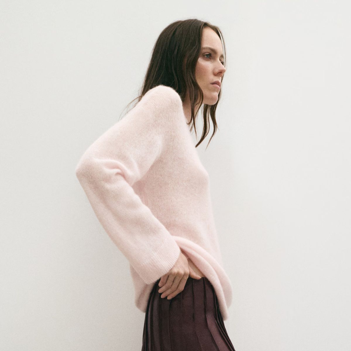 model wearing black Zara coat