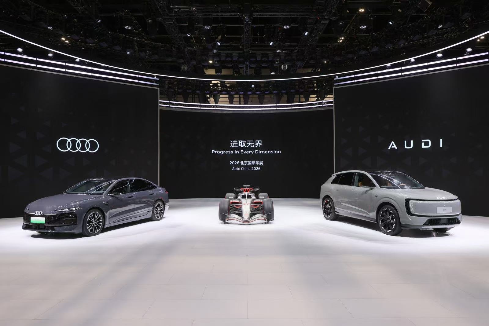 Audi A6L e-tron, R26 F1 car and AUDI E7X