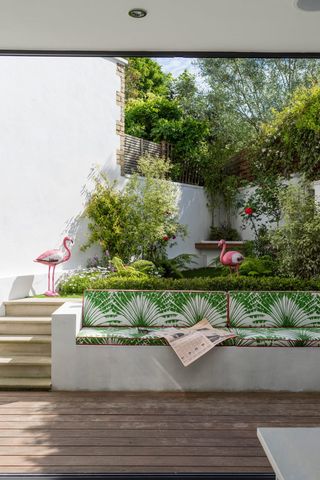 a patio garden spread over different heights to add interest and draw the eye out
