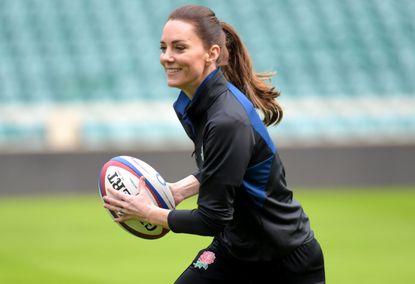 Kate Middleton rugby LONDON, ENGLAND - FEBRUARY 02: Catherine, Duchess of Cambridge takes part in an England rugby training session, after becoming Patron of the Rugby Football Union at Twickenham Stadium on February 2, 2022 in London, England. (Photo Jeremy Selwyn - by WPA Pool/Getty Images)