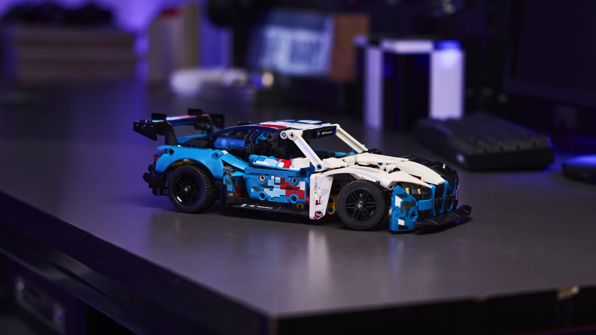 Lego BMW car set on a gray surface