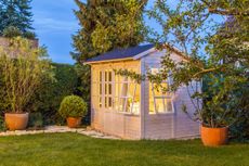 a well lit garden shed