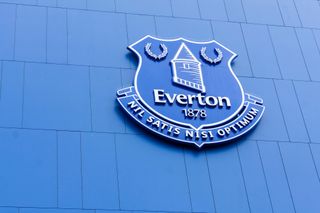 The Everton badge on a blue wall at Goodison Park