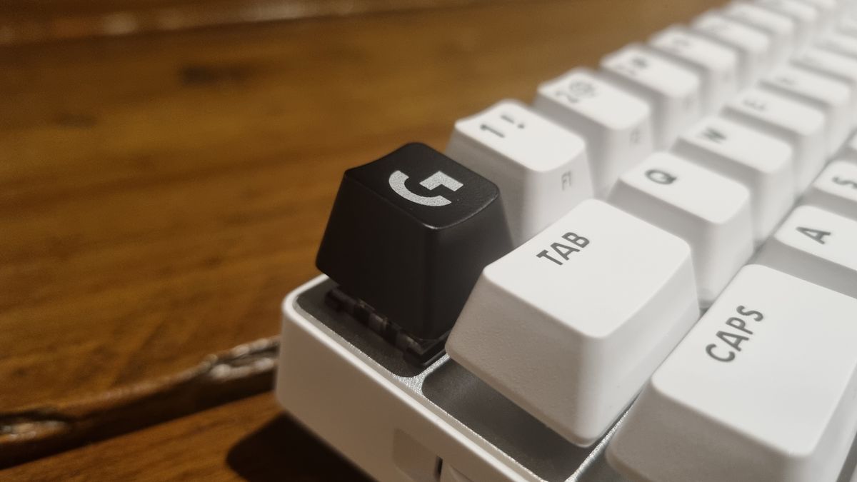 The black "G" key on the top left of the Logitech Pro X60