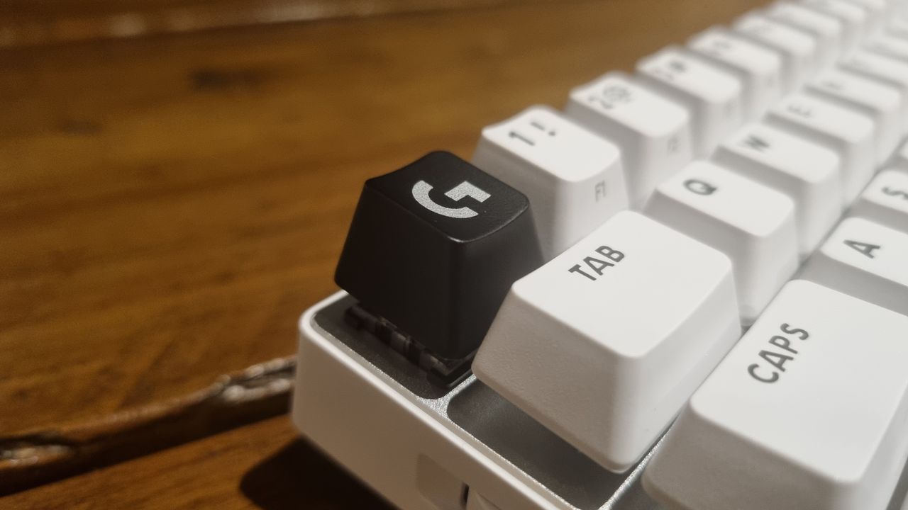 The black "G" key on the top left of the Logitech Pro X60