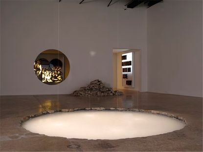 Artist Doug Aitken has excavated a giant hole in the middle of New York's 303 Gallery