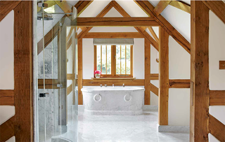 Drummonds - bathroom with antique marble bath