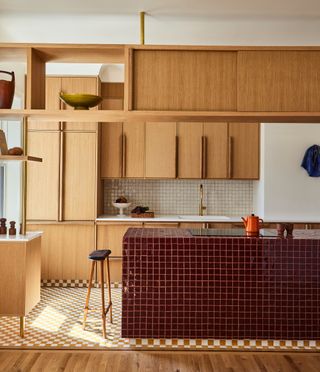 a kitchen with a tiled island