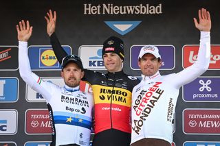 Italian Sonny Colbrelli of Bahrain Victorious Belgian Wout Van Aert of Team JumboVisma and Belgian Greg Van Avermaet of AG2R Citroen pictured on the podium after the mens elite race of the Omloop Het Nieuwsblad oneday cycling race 2042km from Gent to Ninove Saturday 26 February 2022 BELGA PHOTO DAVID STOCKMAN Photo by DAVID STOCKMANBELGA MAGAFP via Getty Images